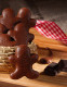 Lebkuchenmännchen von Milchschokolade ummantelt